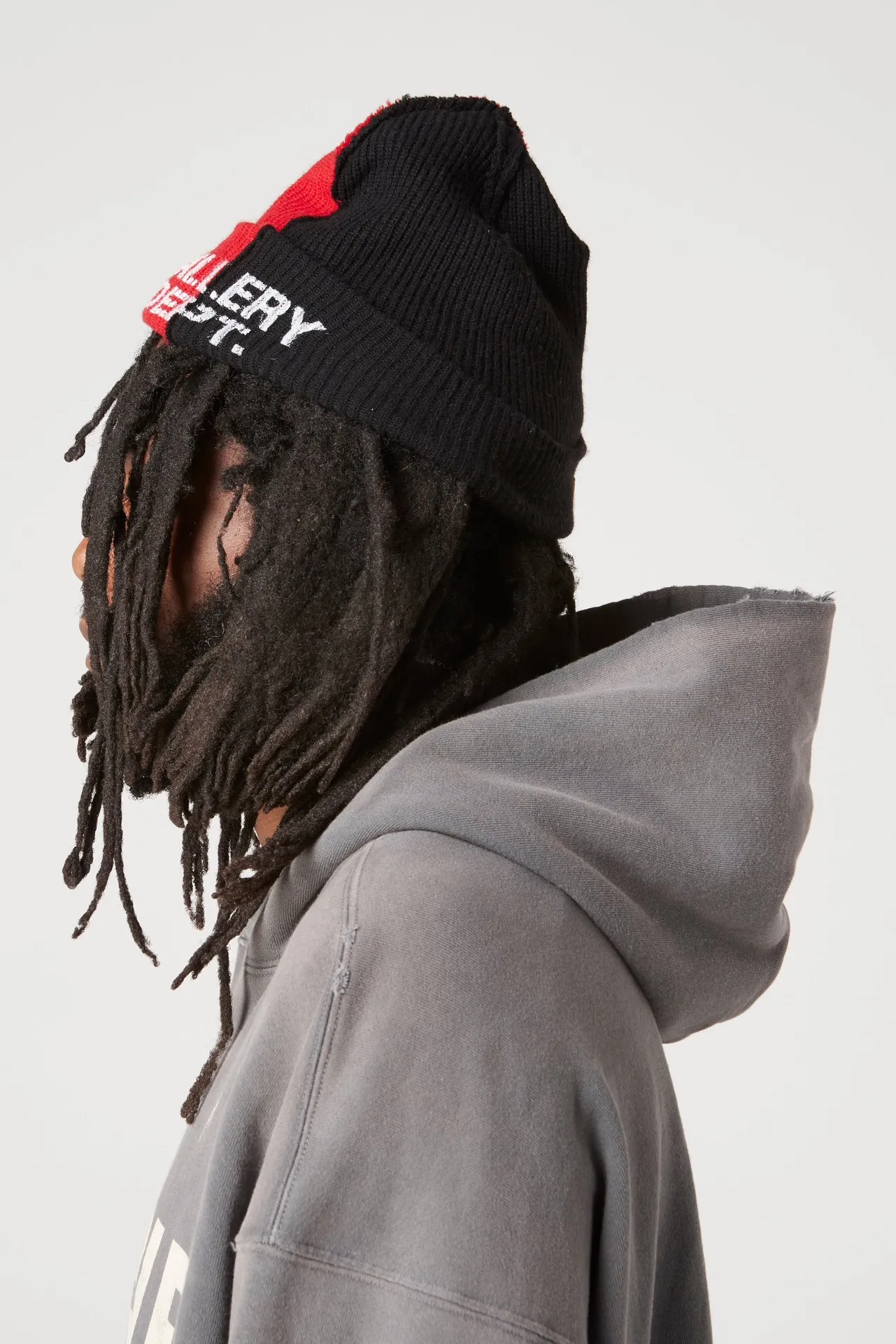 GALLERY DEPT. 90'S RECYCLE HOODIE WASHED BLACK 90'S washed hoodie with distressed eco-friendly slogans. Washed black S-XL. Ready-made garments are washed and dyed again. Multiple spots throughout the body are spray-faded. The ribs are cut and worn.